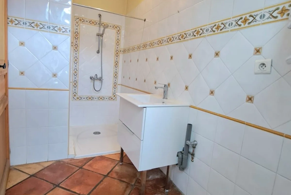 Maison 134 m² avec 3 chambres, jardin et potentiel d'agrandissement à Moissac 