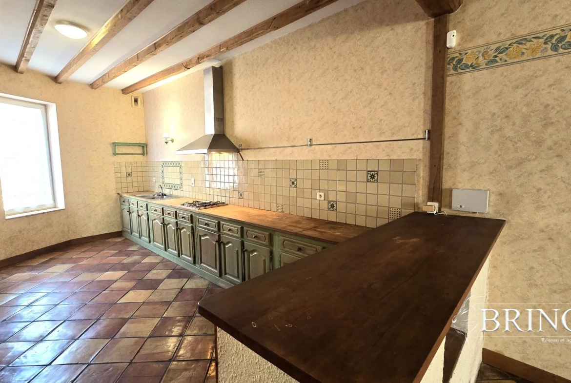 Maison 134 m² avec 3 chambres, jardin et potentiel d'agrandissement à Moissac 