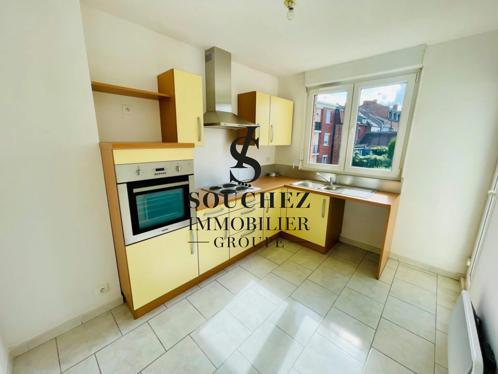 Appartement lumineux avec garage et cave à Lens - Secteur calme 