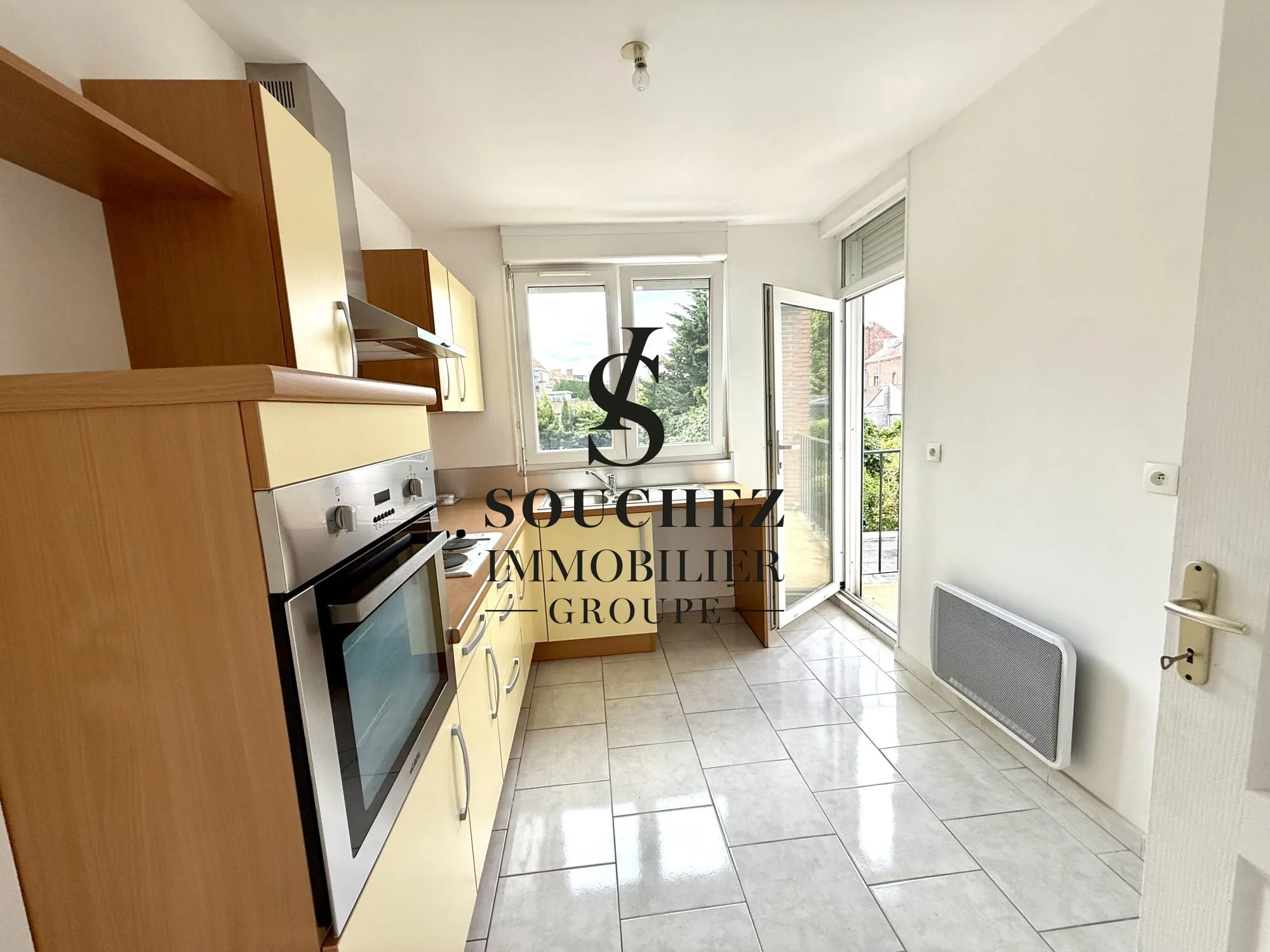 Appartement lumineux avec garage et cave à Lens - Secteur calme 