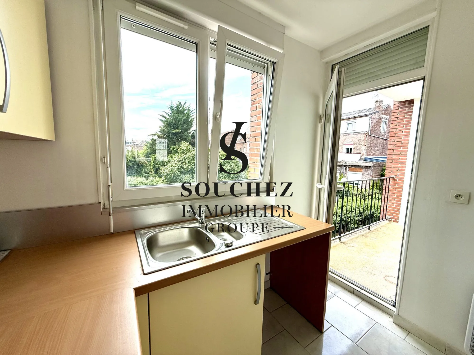 Appartement lumineux avec garage et cave à Lens - Secteur calme 