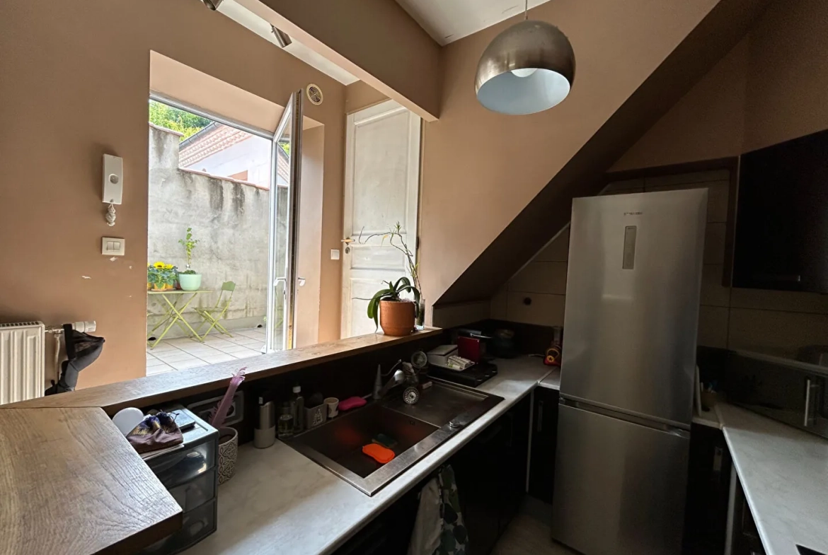 Appartement de type 4 avec terrasse à Saint-Chamond - 3 chambres, 50 m2 