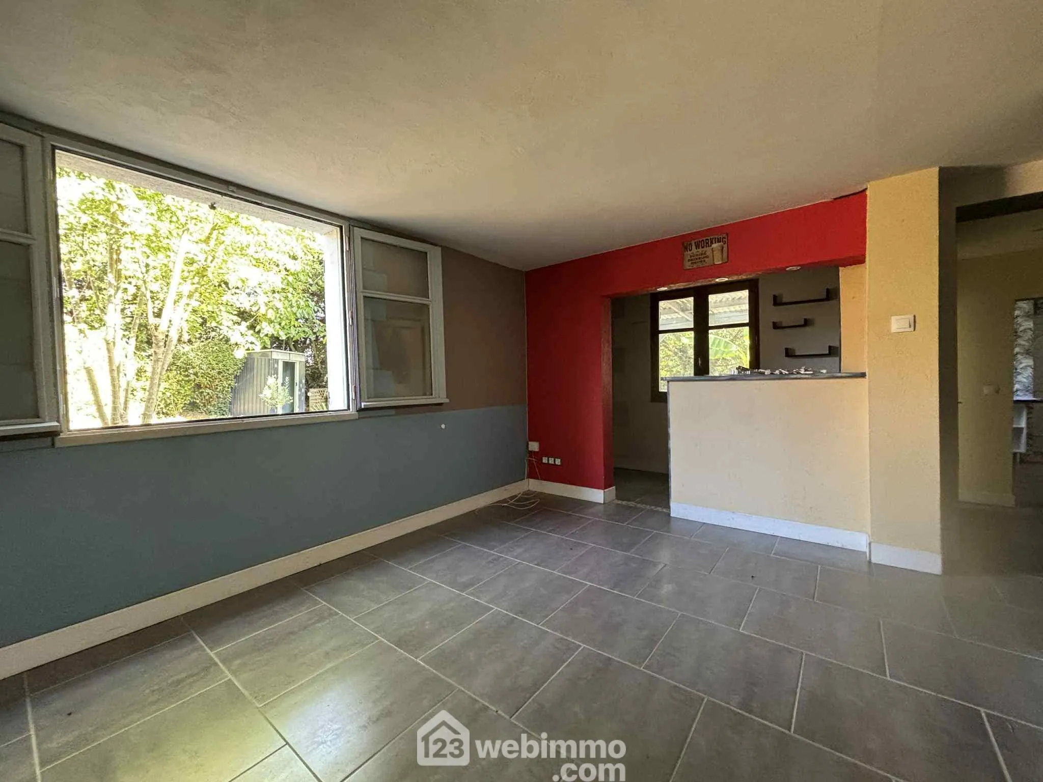 Maison à vendre de 92 m² à Thuré avec terrain et garage - Potentiel à exploiter 