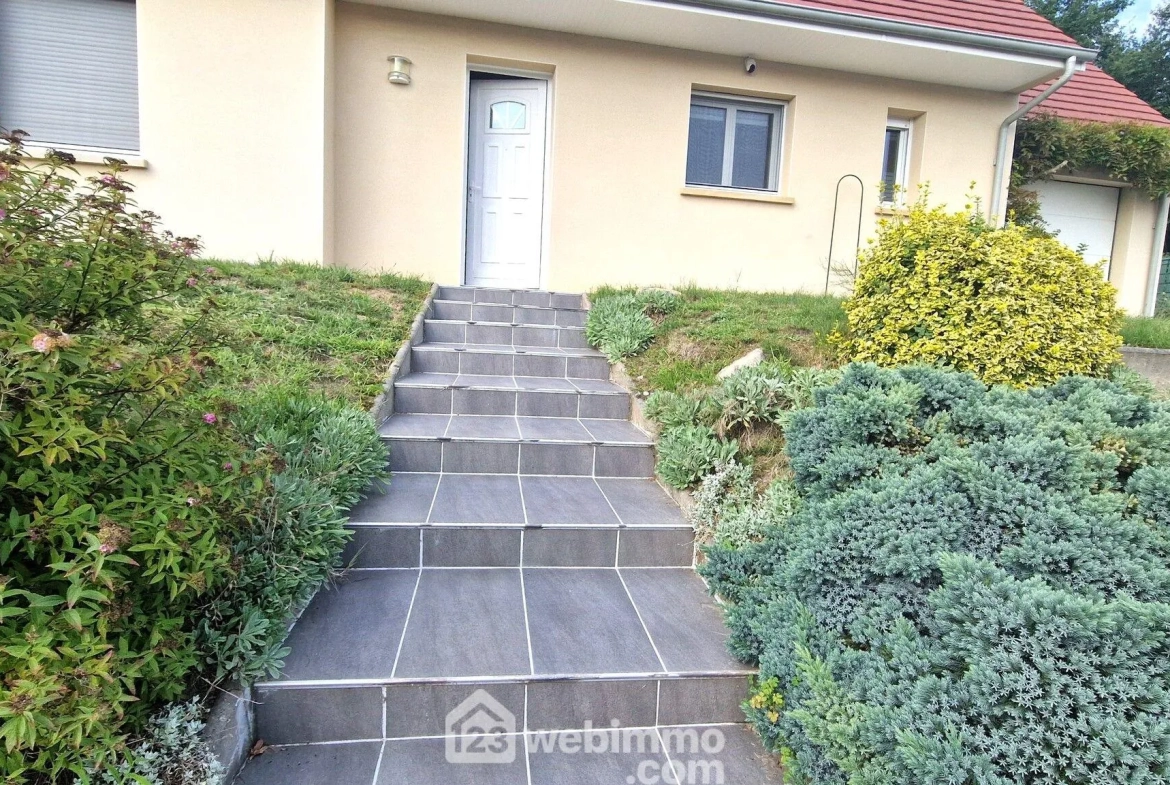 Belle maison de plain-pied de 103 m² à Mons-en-Laonnois avec piscine et garage 