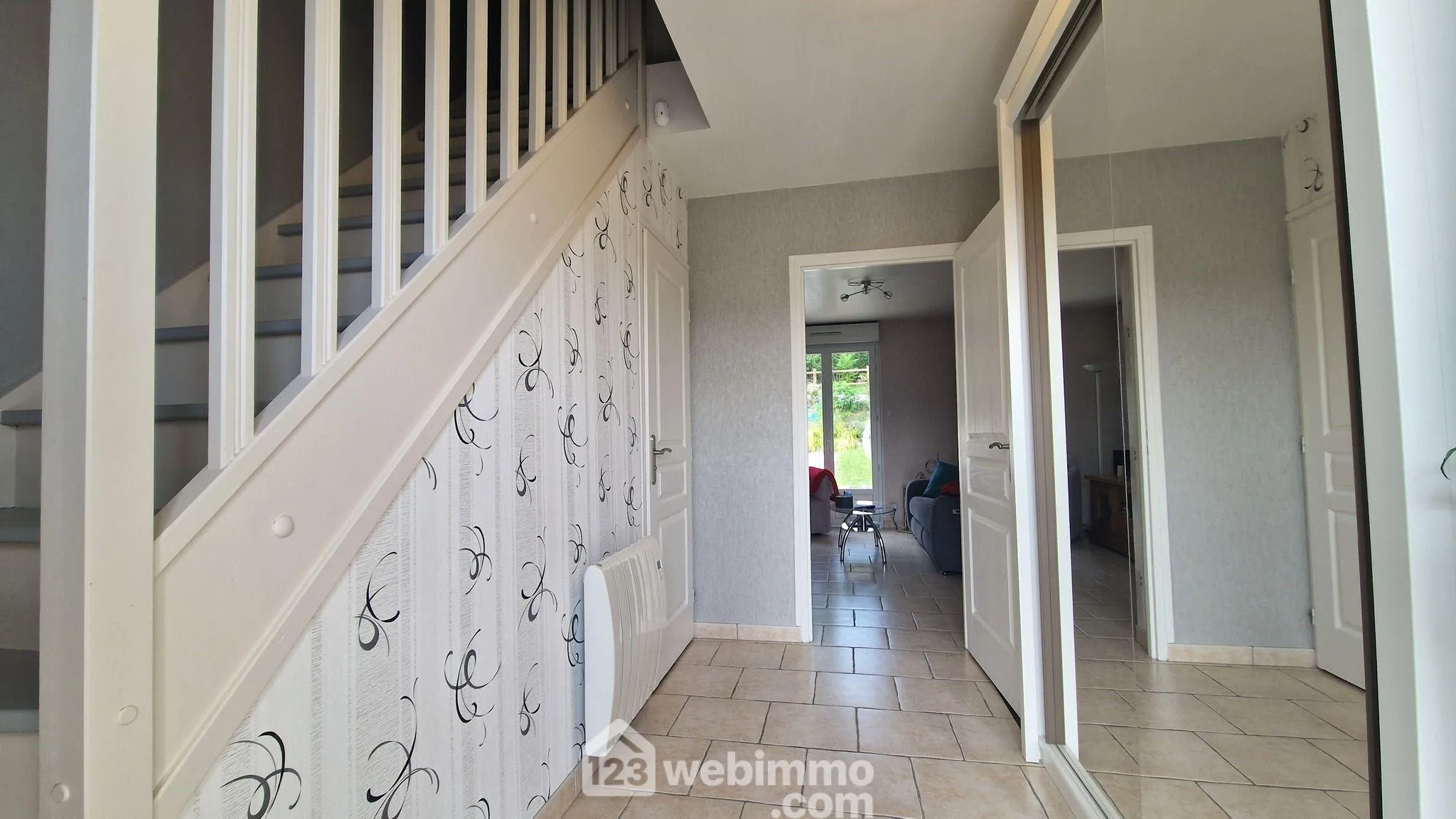 Belle maison de plain-pied de 103 m² à Mons-en-Laonnois avec piscine et garage 