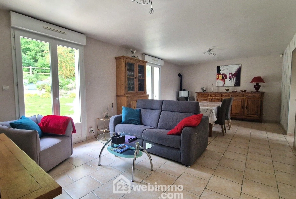 Belle maison de plain-pied de 103 m² à Mons-en-Laonnois avec piscine et garage 
