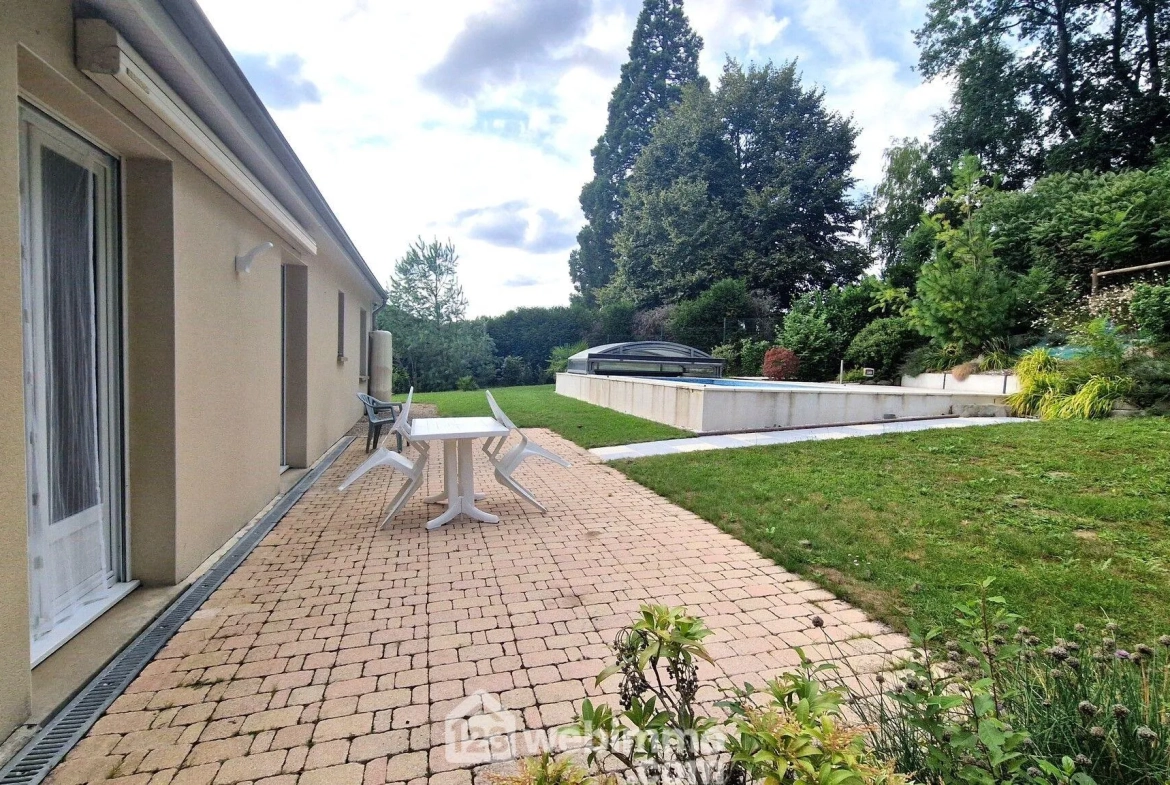Belle maison de plain-pied de 103 m² à Mons-en-Laonnois avec piscine et garage 
