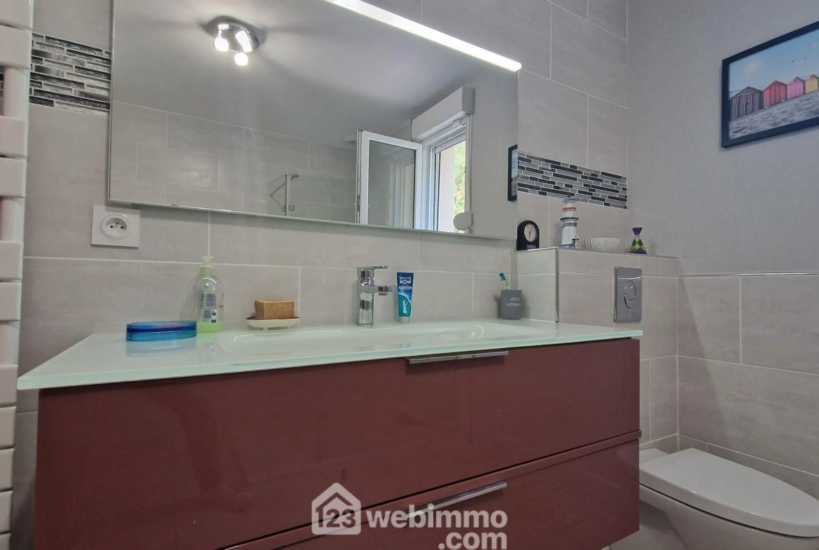 Belle maison de plain-pied de 103 m² à Mons-en-Laonnois avec piscine et garage 