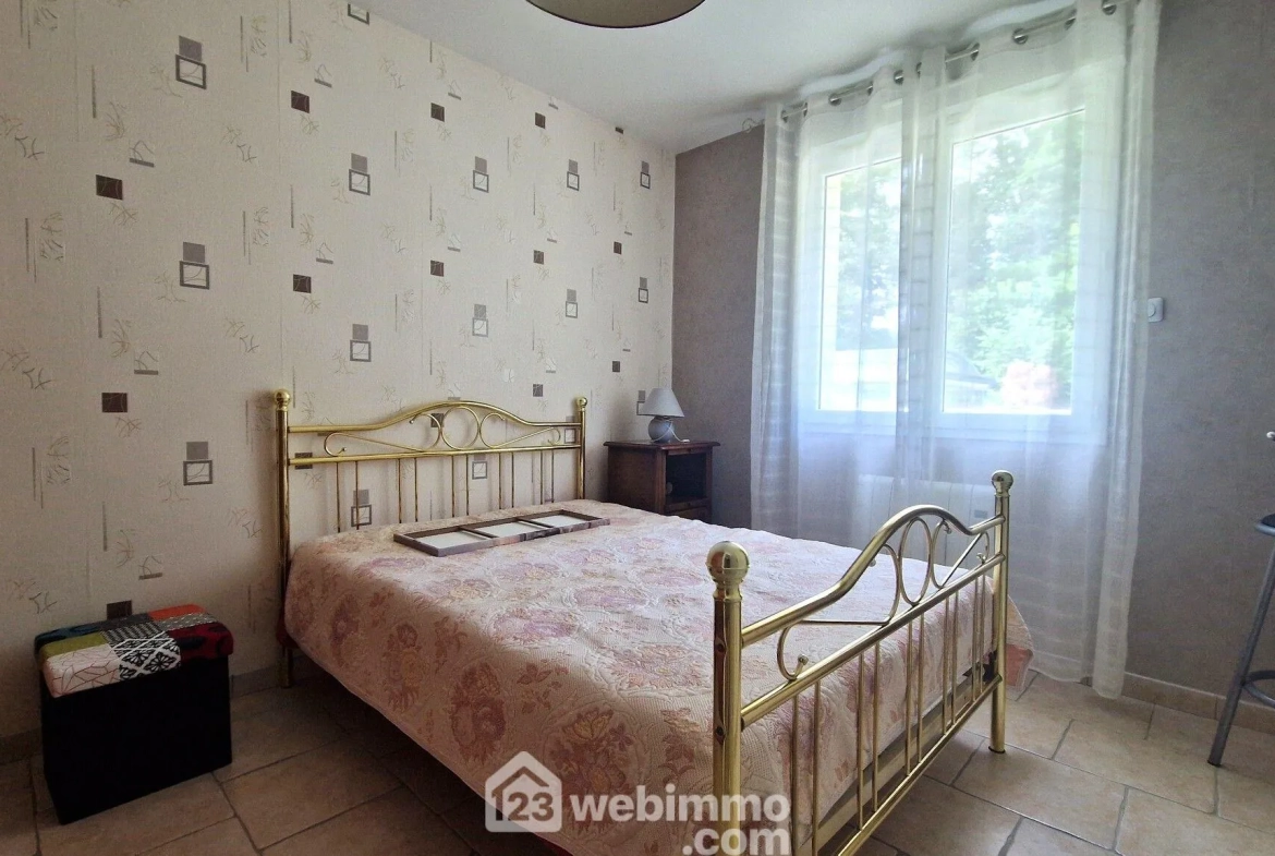 Belle maison de plain-pied de 103 m² à Mons-en-Laonnois avec piscine et garage 