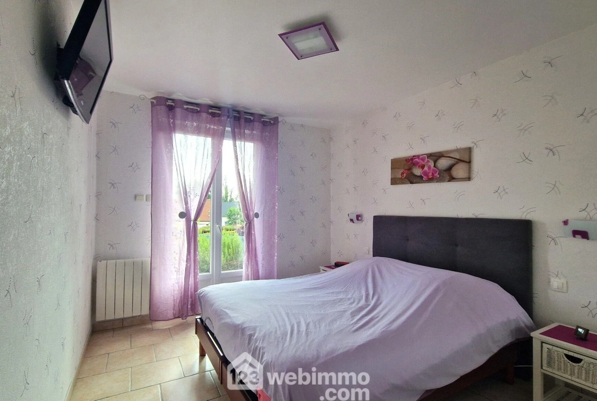 Belle maison de plain-pied de 103 m² à Mons-en-Laonnois avec piscine et garage 
