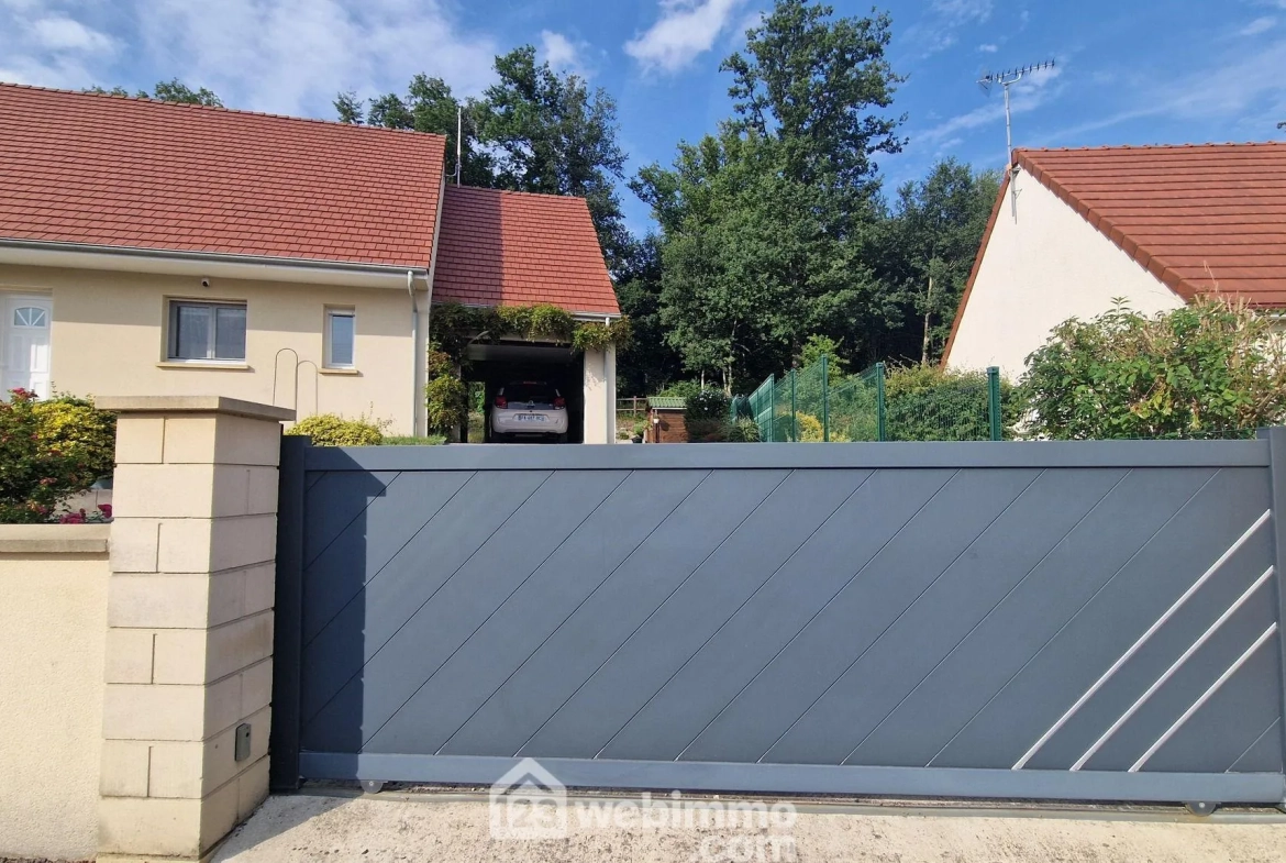 Belle maison de plain-pied de 103 m² à Mons-en-Laonnois avec piscine et garage 