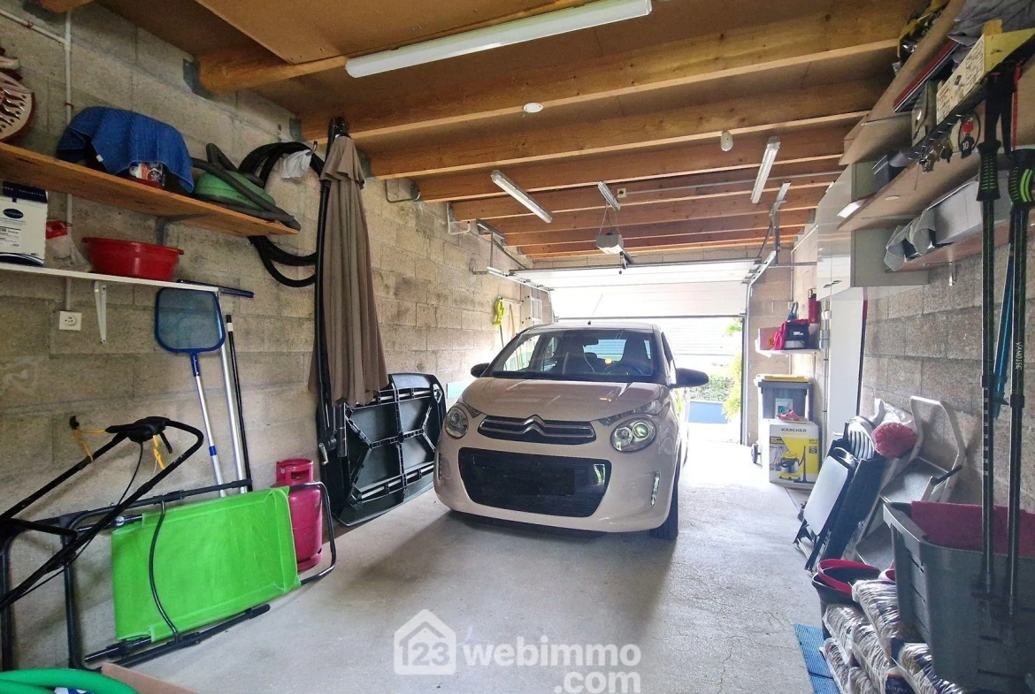 Belle maison de plain-pied de 103 m² à Mons-en-Laonnois avec piscine et garage 