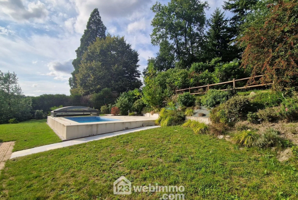 Belle maison de plain-pied de 103 m² à Mons-en-Laonnois avec piscine et garage 