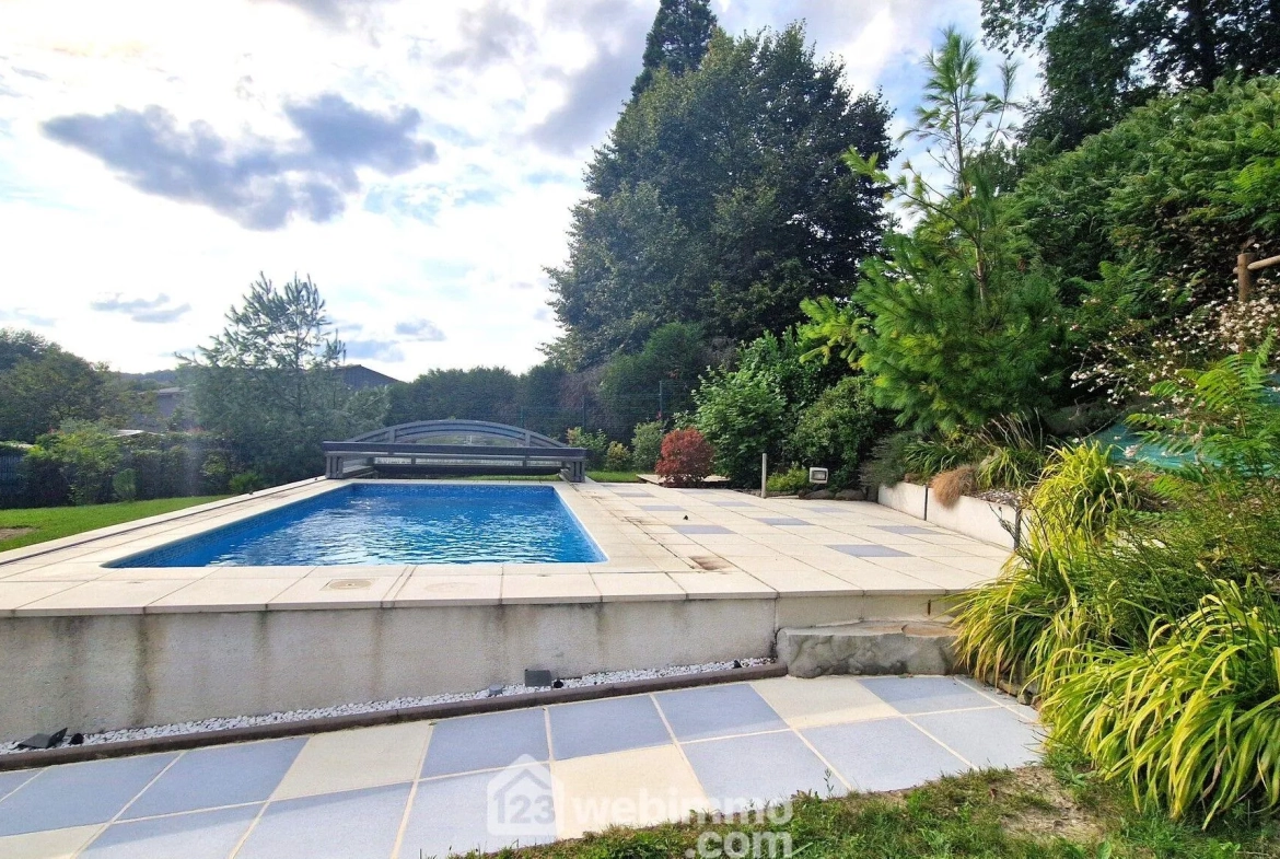 Belle maison de plain-pied de 103 m² à Mons-en-Laonnois avec piscine et garage 