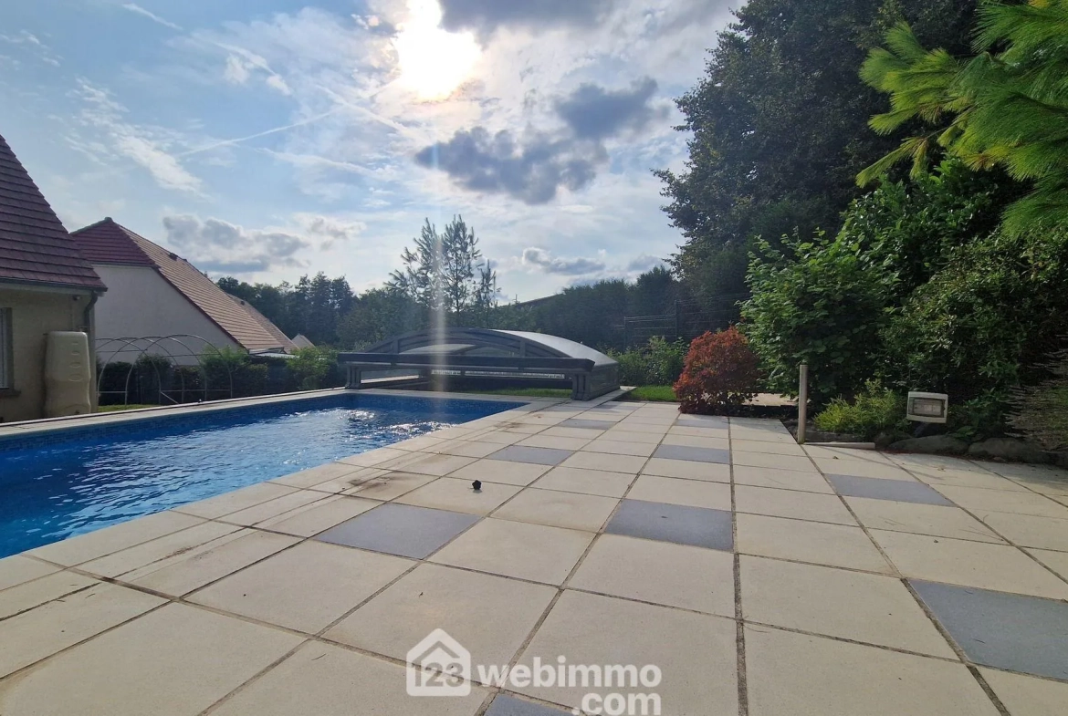 Belle maison de plain-pied de 103 m² à Mons-en-Laonnois avec piscine et garage 