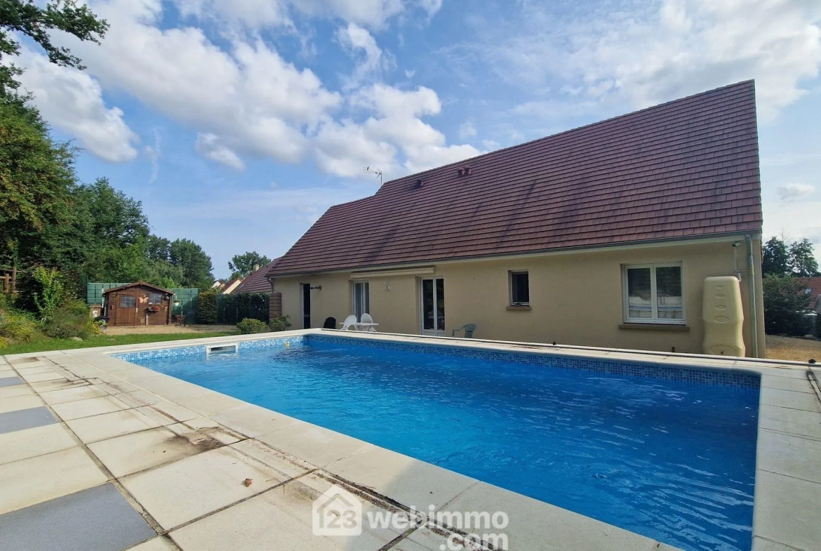 Belle maison de plain-pied de 103 m² à Mons-en-Laonnois avec piscine et garage 