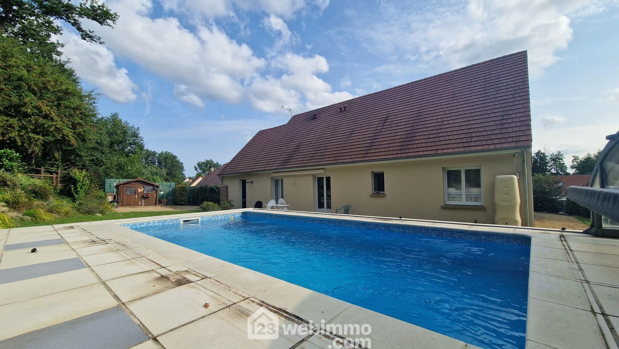 Belle maison de plain-pied de 103 m² à Mons-en-Laonnois avec piscine et garage 