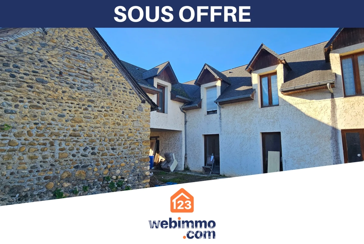 Maison à rénover avec grange sur terrain de 1200 m² à Narcastet 