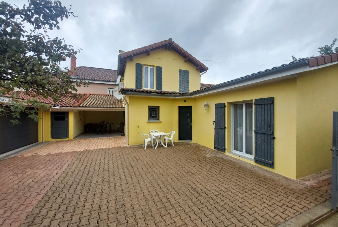 Maison avec garage et terrain à Montbrison - Centre-ville 