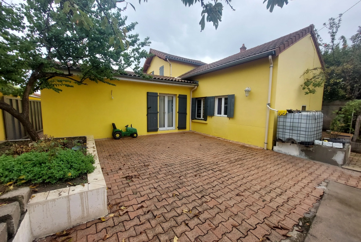 Maison avec garage et terrain à Montbrison - Centre-ville 