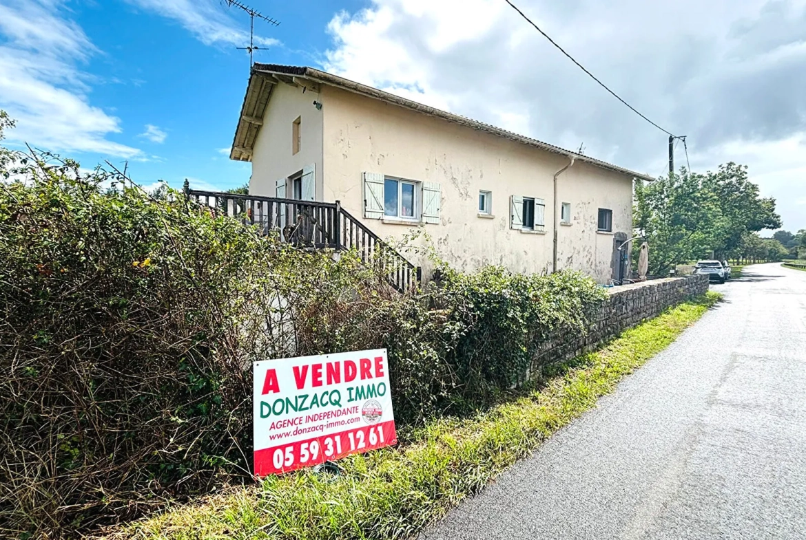 Maison ancienne à Urt avec grande parcelle et potentiel locatif à saisir 