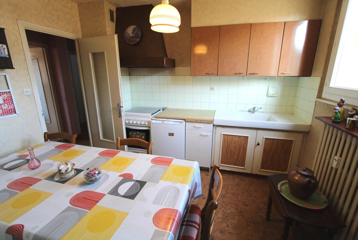 Appartement T3 à Ville La Grand avec balcon, cave et parking 