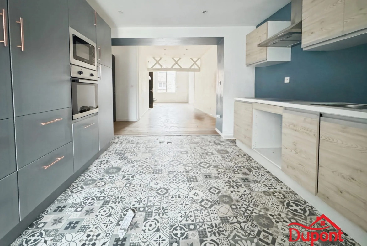 Maison mitoyenne de 110 m² avec jardin à Le Cateau-Cambrésis 