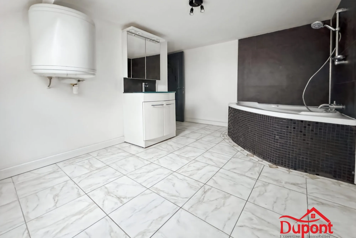 Maison mitoyenne de 110 m² avec jardin à Le Cateau-Cambrésis 