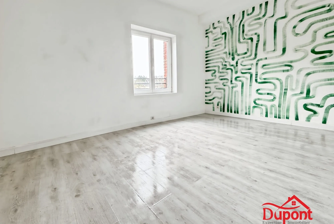 Maison mitoyenne de 110 m² avec jardin à Le Cateau-Cambrésis 