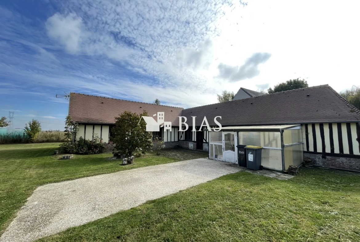 Maison de plain-pied à vendre au Neubourg avec garage et terrain spacieux 