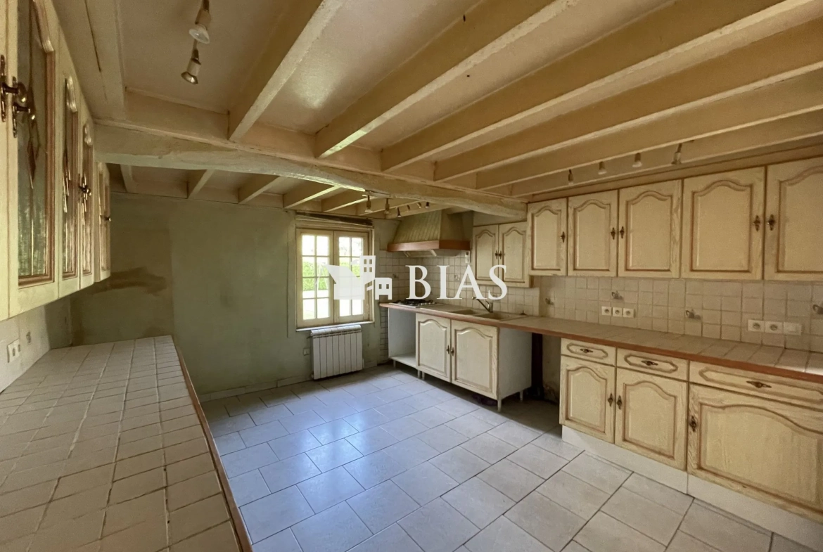 Maison de plain-pied à vendre au Neubourg avec garage et terrain spacieux 