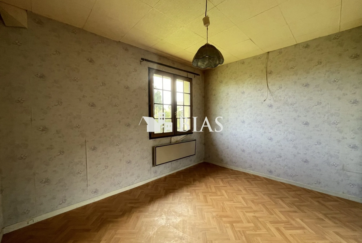 Maison de plain-pied à vendre au Neubourg avec garage et terrain spacieux 