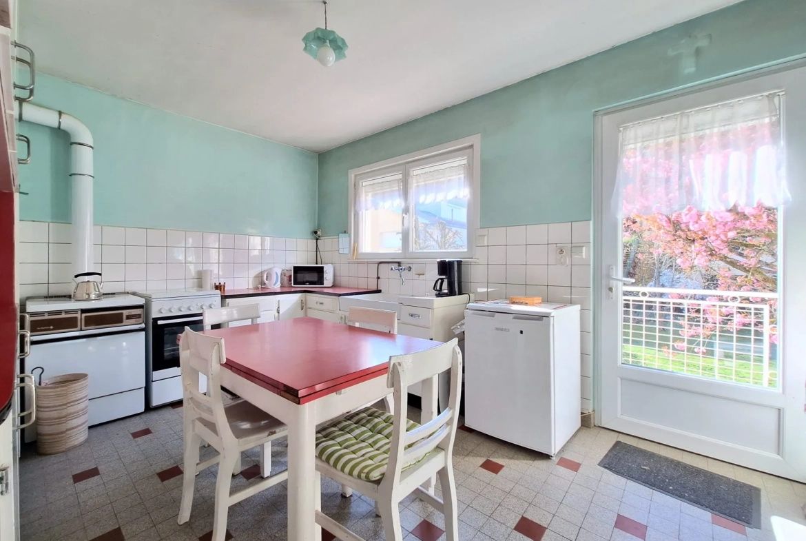 Maison de ville à Épinal 110 m² avec jardin, garage et travaux à prévoir 