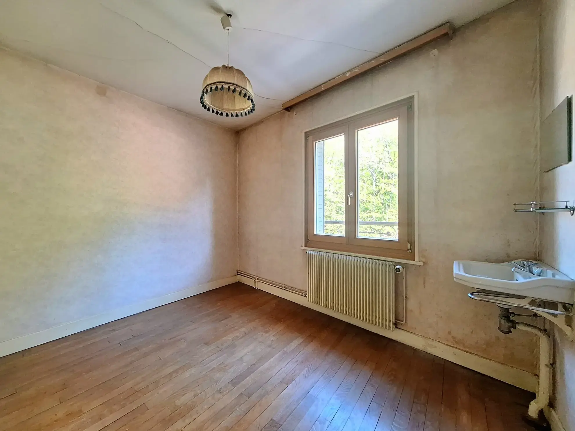 Maison de ville à Épinal 110 m² avec jardin, garage et travaux à prévoir 