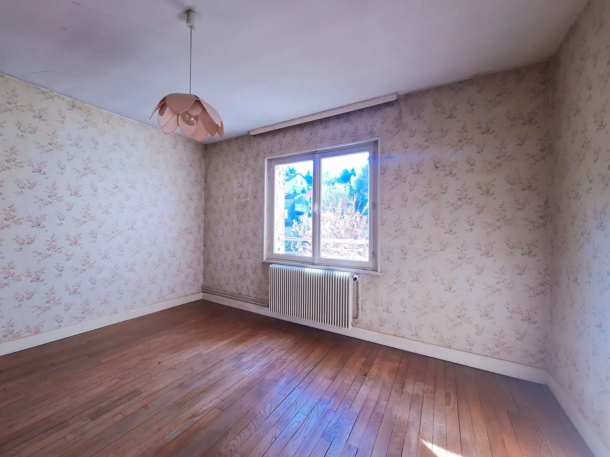 Maison de ville à Épinal 110 m² avec jardin, garage et travaux à prévoir 