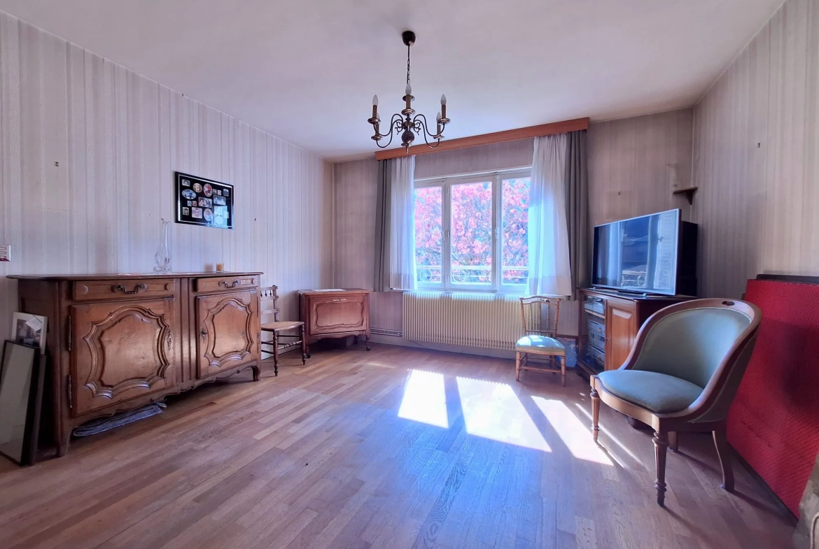 Maison de ville à Épinal 110 m² avec jardin, garage et travaux à prévoir 