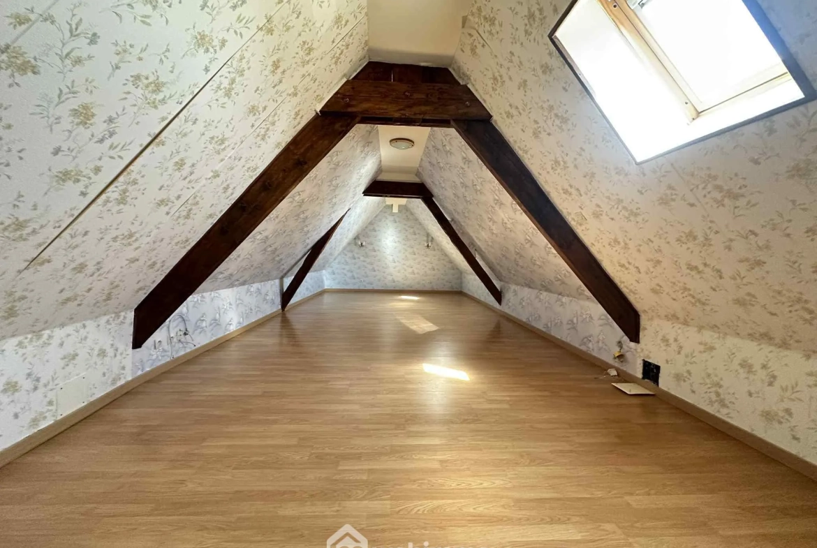 Maison de plain-pied à Athies-sous-Laon avec grand terrain et garage 