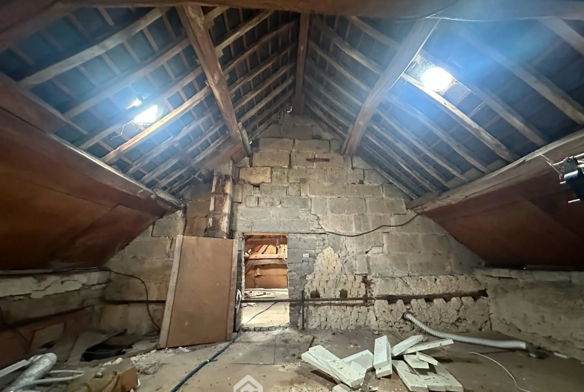 Maison de plain-pied à Athies-sous-Laon avec grand terrain et garage 