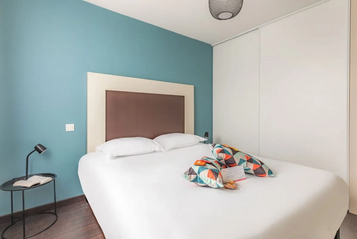 Appartement triplex loué à vendre à Saint-Jean-d'Illac avec rendement attractif 