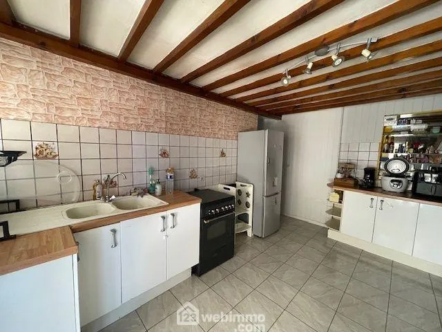 Maison à Noyon de 115m² avec dépendances et terrain constructible 