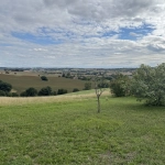 Terrain de 1580 m² avec vue imprenable à Lanta - Projet de construction personnalisé