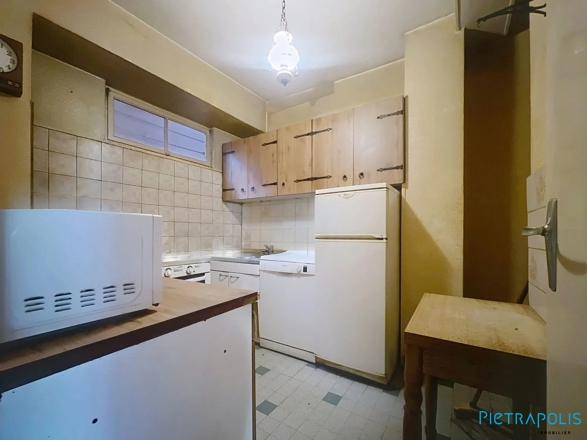 Maison de ville à Tarare avec duplex, caves et local, idéale pour grands projets ou famille 
