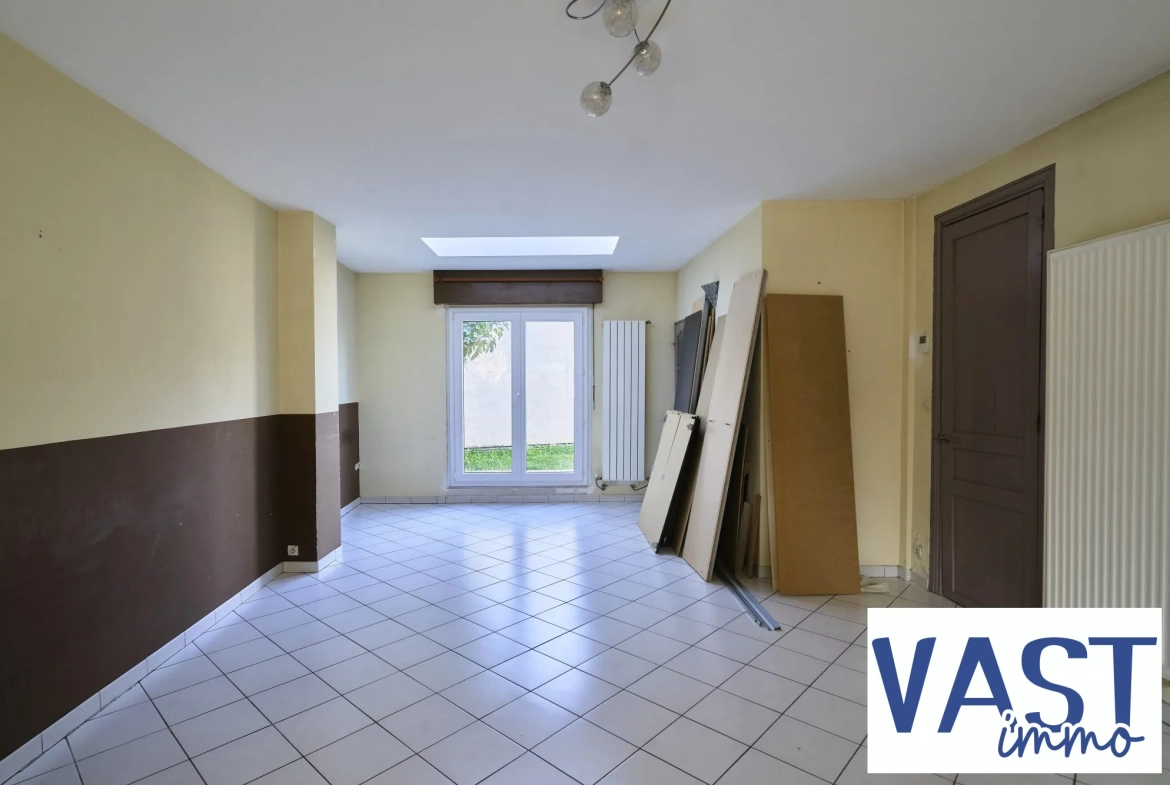 Maison ancienne de 1930 avec jardin à Roubaix – Charme et potentiel 