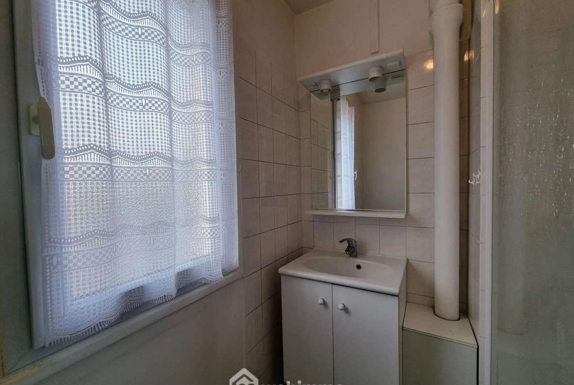 Appartement traversant de 64,61 m² à Choisy-le-Roi avec cave et jardin 