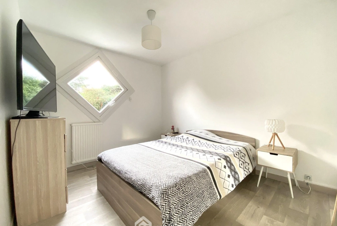 Charmante maison mitoyenne de 100 m² à Bondoufle avec jardin et garage 