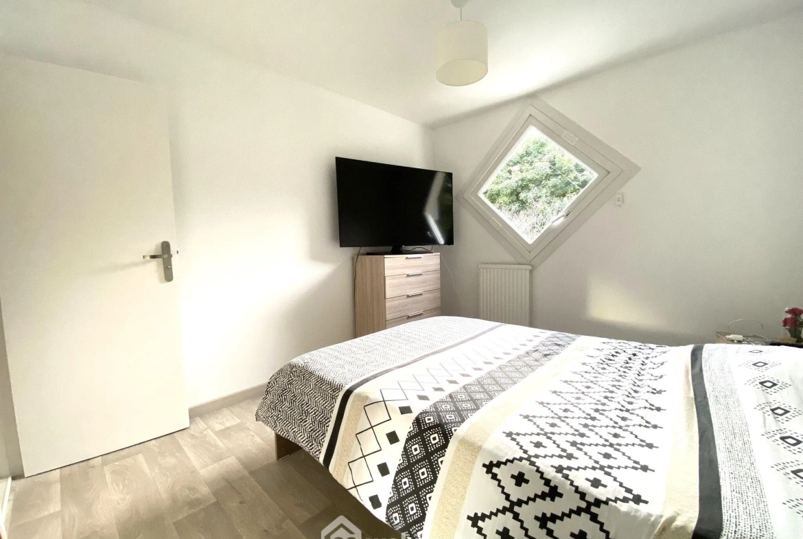 Charmante maison mitoyenne de 100 m² à Bondoufle avec jardin et garage 