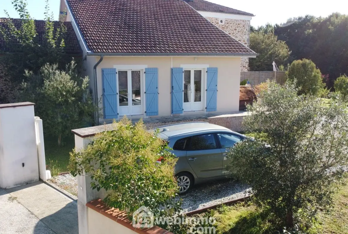 Maison lumineuse de 119 m² avec jardin et potentiel locatif à Hagetmau 