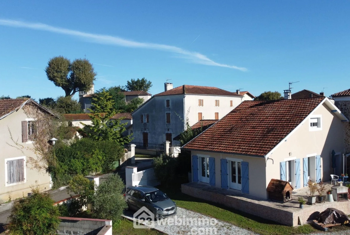 Maison lumineuse de 119 m² avec jardin et potentiel locatif à Hagetmau 