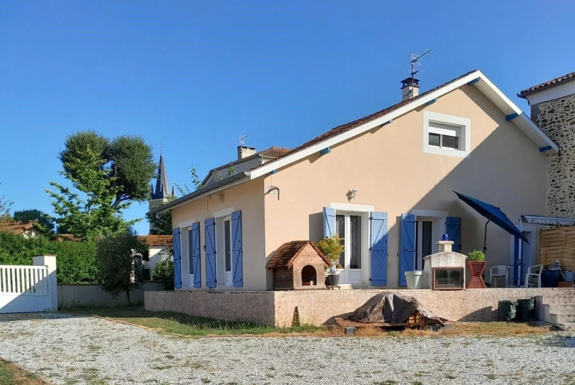 Maison lumineuse de 119 m² avec jardin et potentiel locatif à Hagetmau 