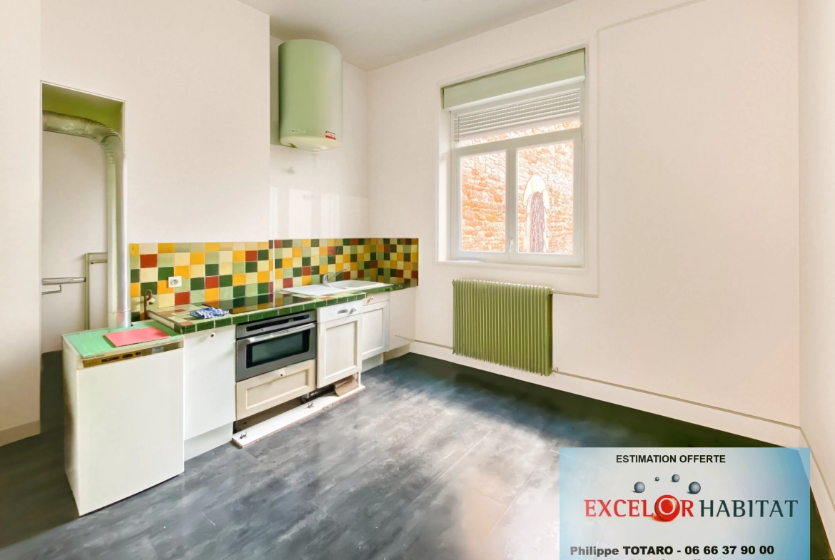 Appartement de caractère à Mâcon de 120 m² avec potentiel de rénovation 